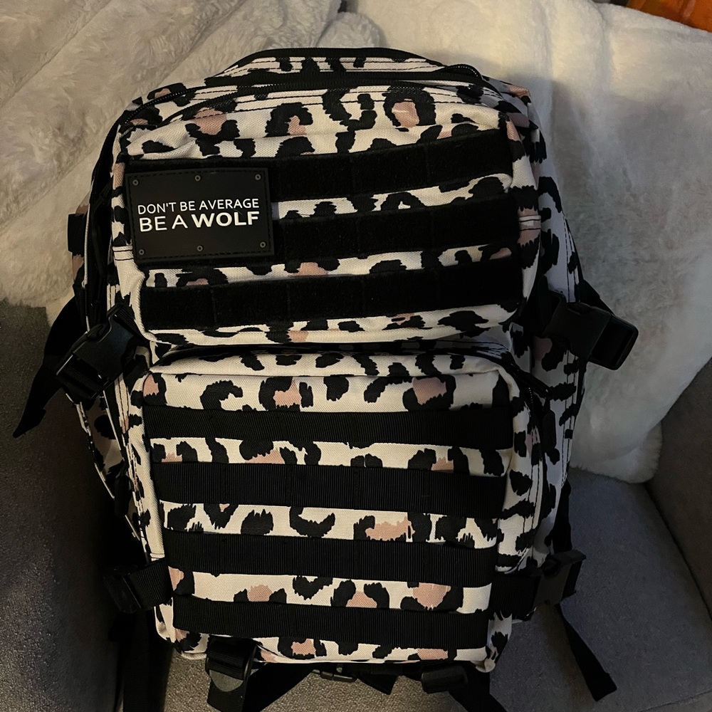 Wolf Pak like NEW large backpack in black and white leopard print